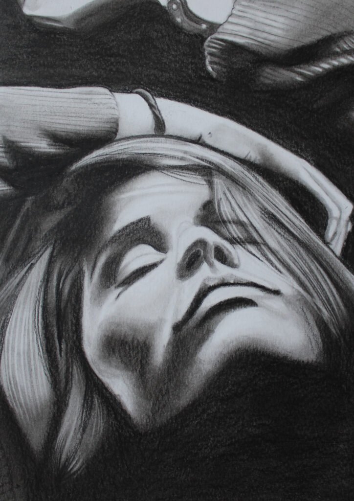 Charcoal portrait of a woman in light